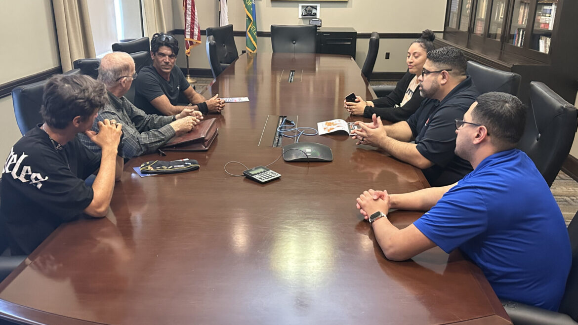 Group of people around a conference table