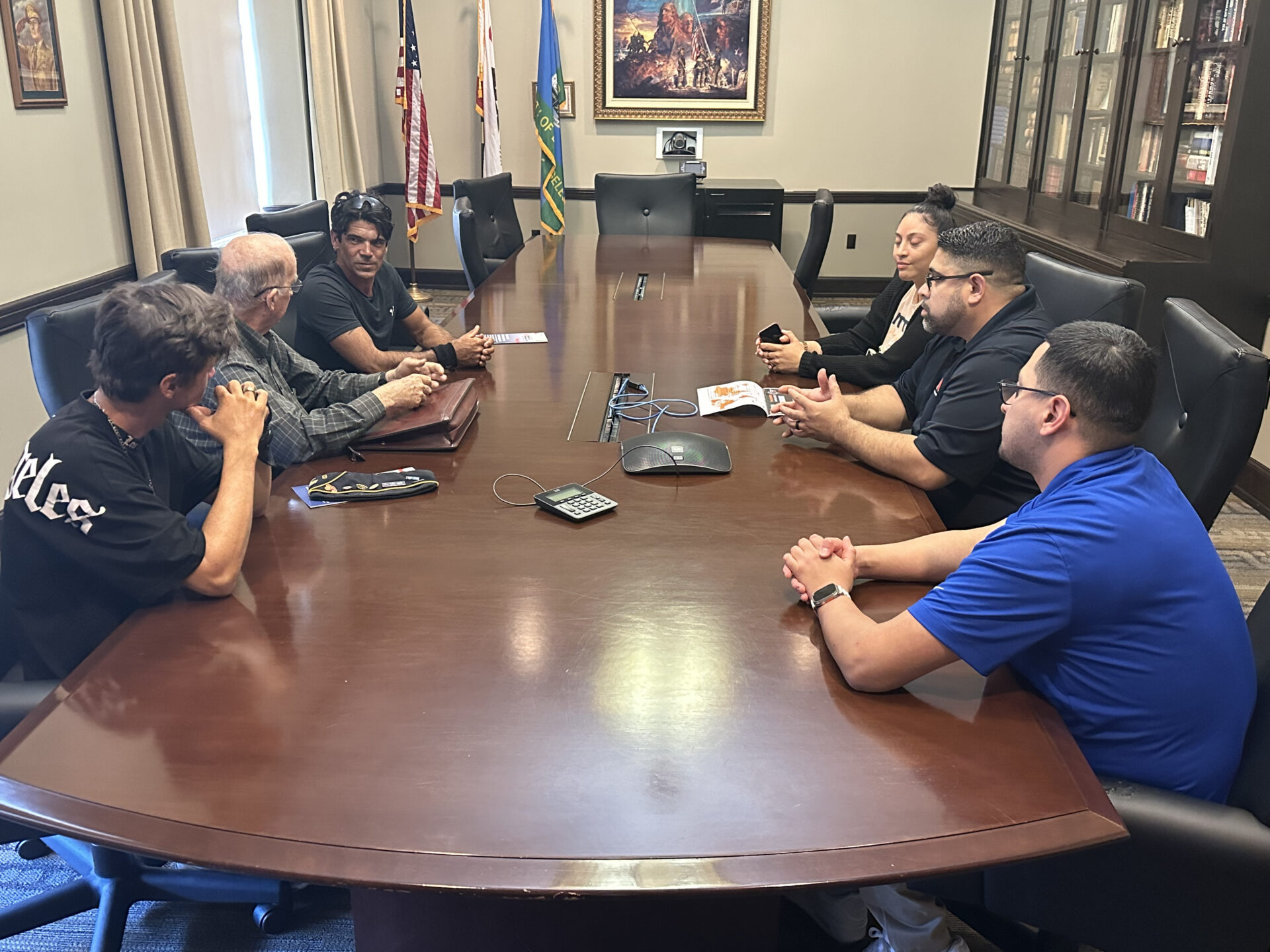 Group of people around a conference table