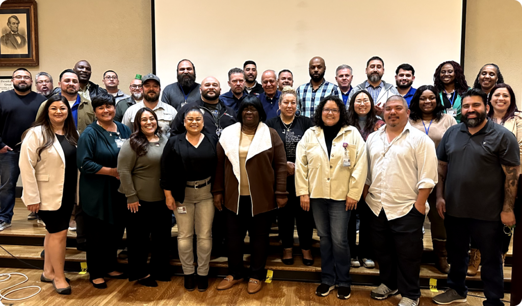 Group of people posing for a picture