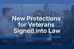Graphic with bold white text reading “New Protections for Veterans Signed into Law” over a blue-toned background featuring three people in conversation, with a government building dome faintly visible behind them.