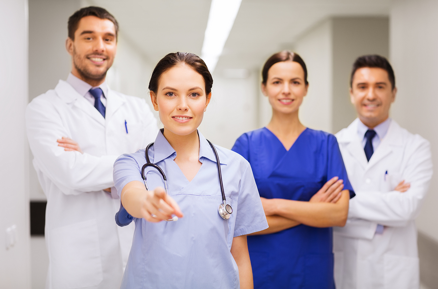 Nurses and Doctors looking and pointing